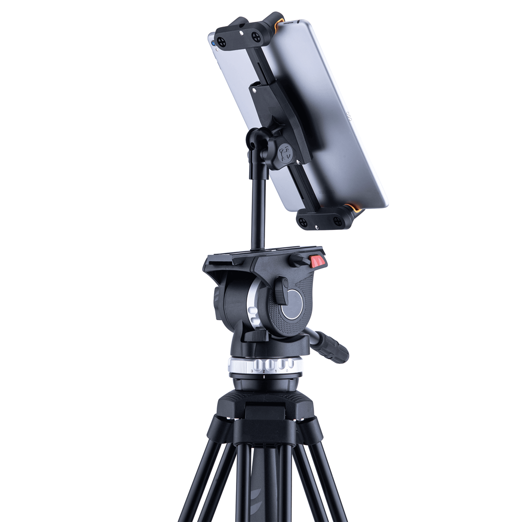 Tripod with a tablet mounted in a holder, tablet in landscape orientation on a swiveling mount